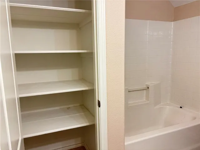 a bathroom with a bathtub