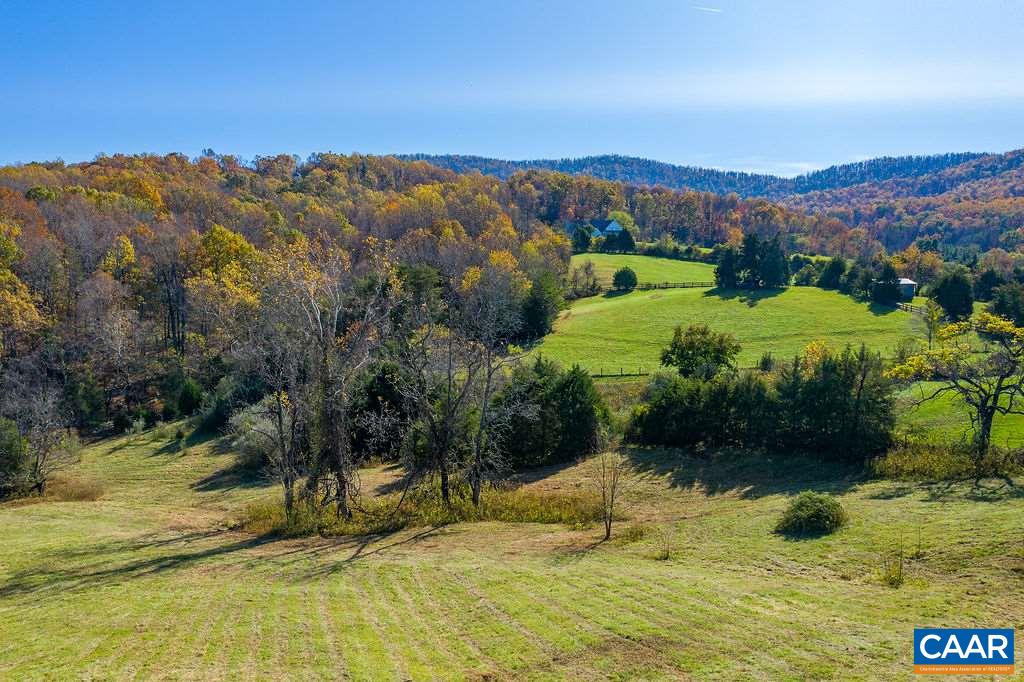 955 Wolf Trap Road Charlottesville, VA 22911 - Photo 3 of 30 a view of a lake with mountains in the background