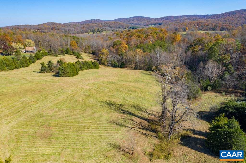 955 Wolf Trap Road Charlottesville, VA 22911 - Photo 8 of 30 a view of a lake with mountains in the background