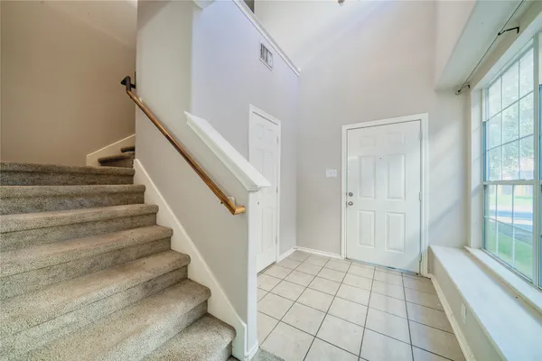 a view of an entryway with staircase