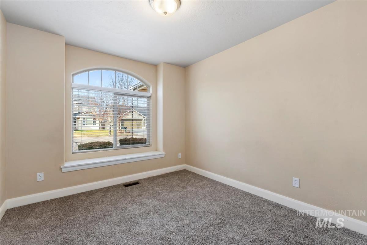1838 Ridge Way Middleton, ID 83644 - Photo 34 of 42 Carpeted spare room with baseboards
