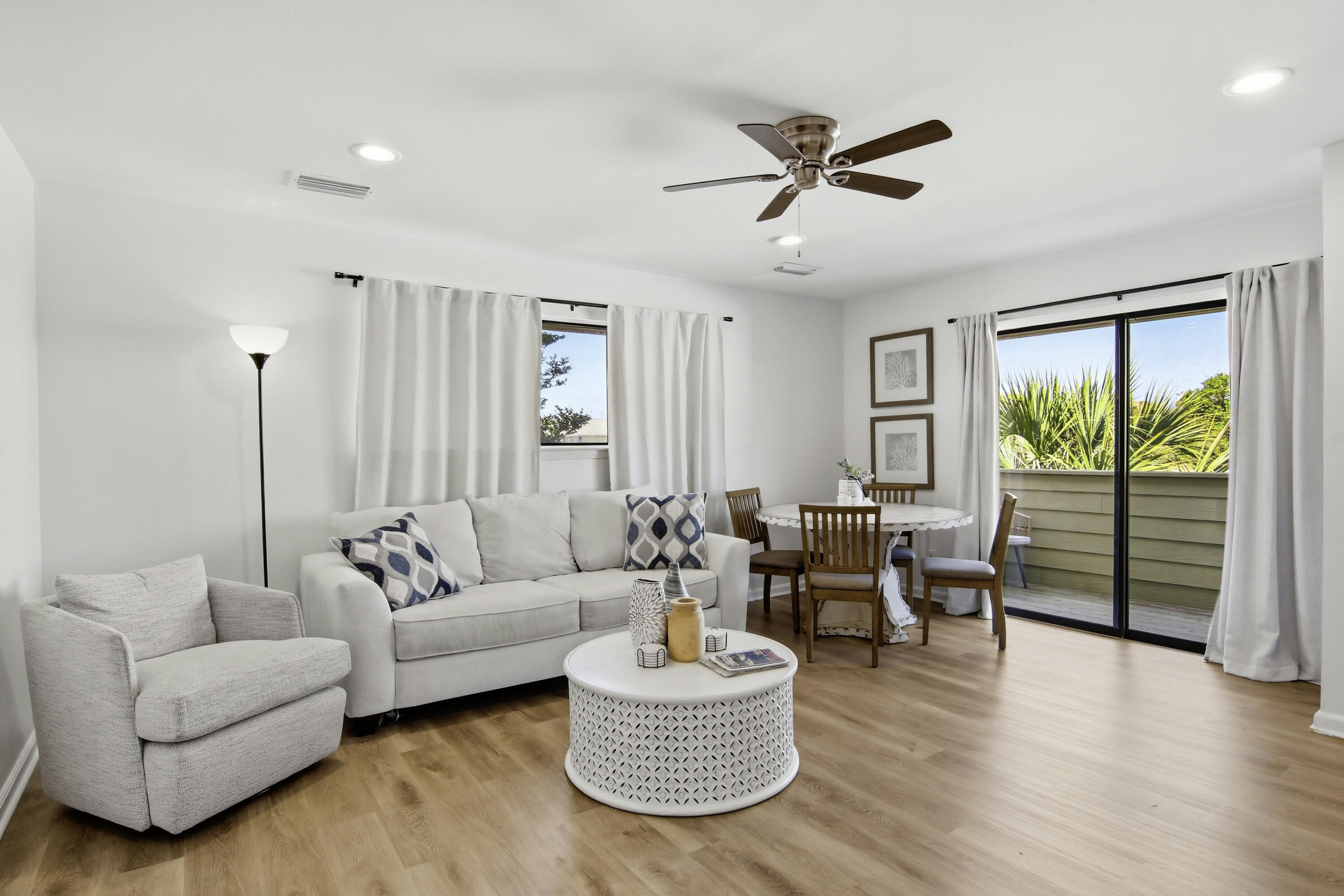 64 Cross Creek Road, Unit 28D Miramar Beach, FL 32550 - Photo 12 of 34 a living room with furniture and a large window