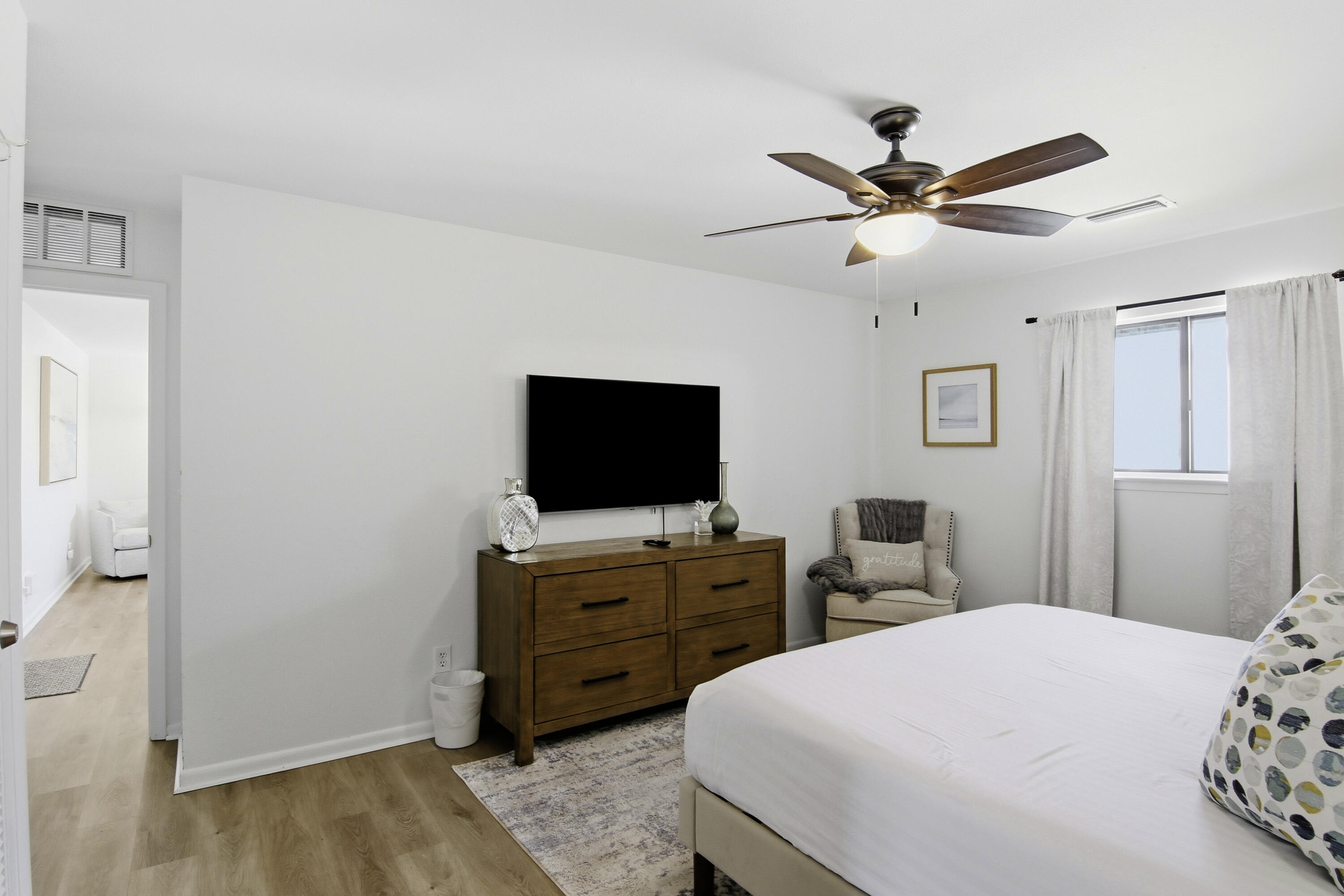 64 Cross Creek Road, Unit 28D Miramar Beach, FL 32550 - Photo 22 of 34 a bedroom with a bed and a flat screen tv