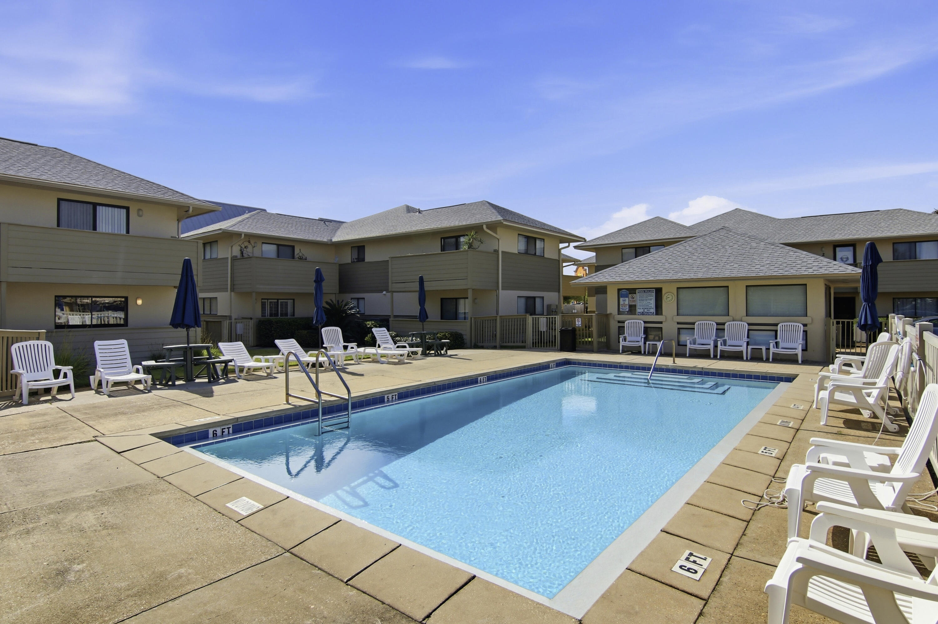 64 Cross Creek Road, Unit 28D Miramar Beach, FL 32550 - Photo 32 of 34 a view of house with swimming pool and furniture