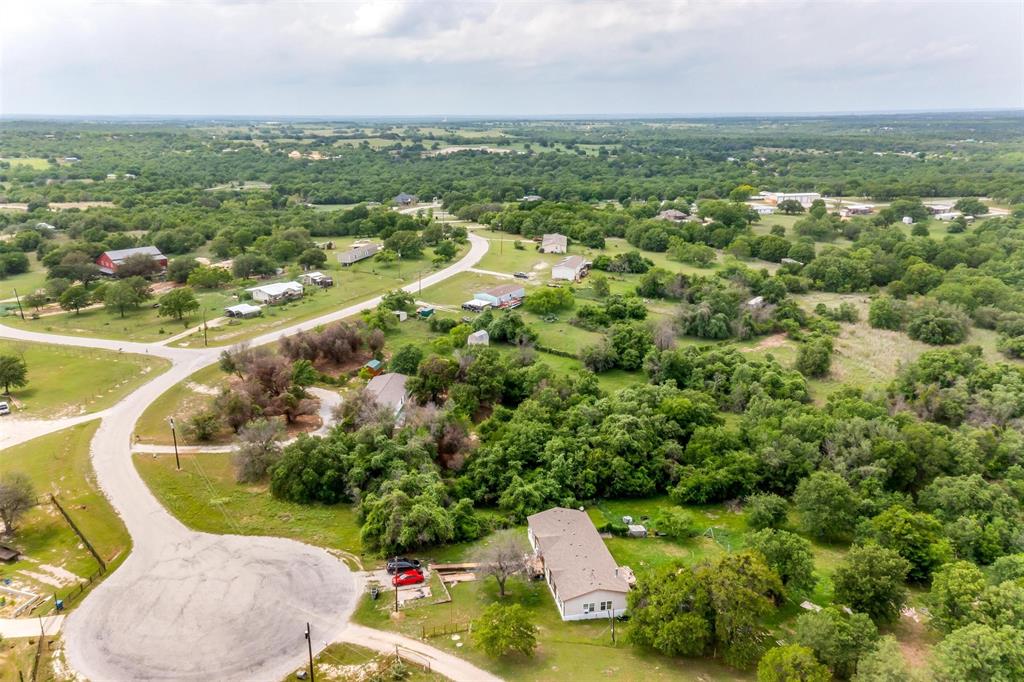 Tbd Rock Salt Drive Springtown, TX 76082 - Photo 2 of 7 an aerial view of a house with a yard
