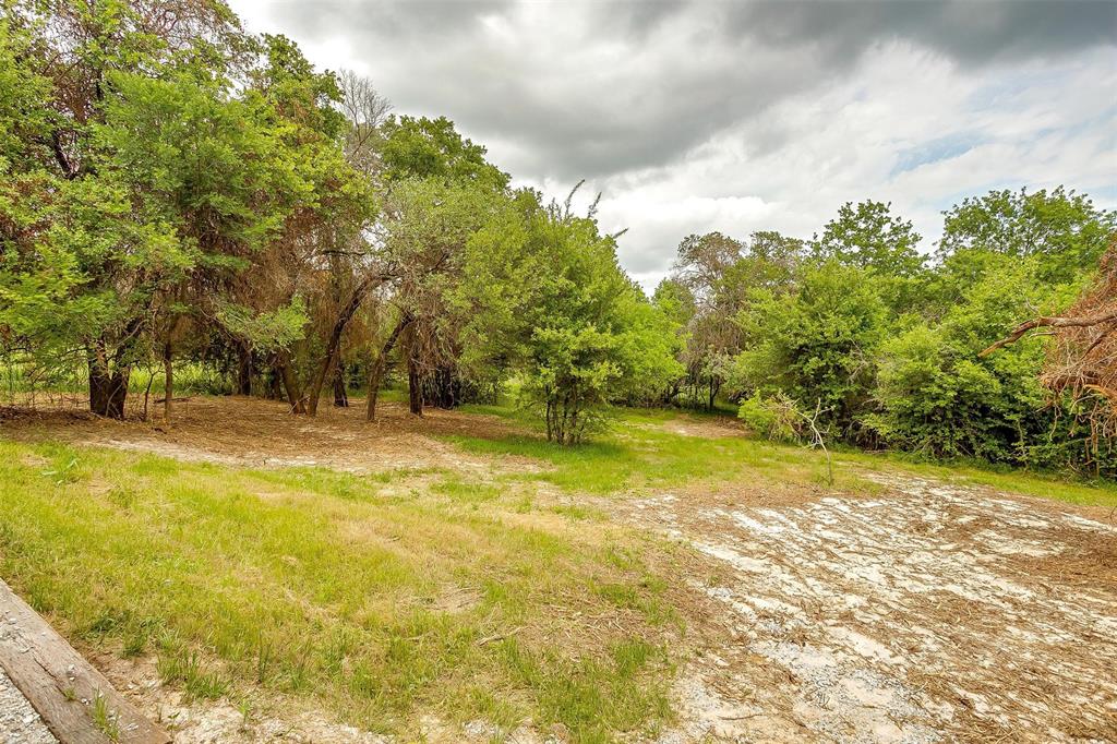 Tbd Rock Salt Drive Springtown, TX 76082 - Photo 6 of 7 a view of yard with swimming pool and trees in the background