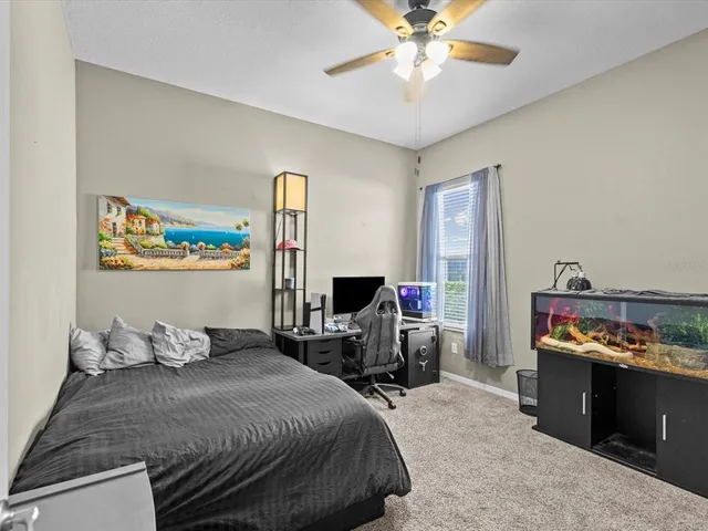 a bathroom with a tub a sink and a shower