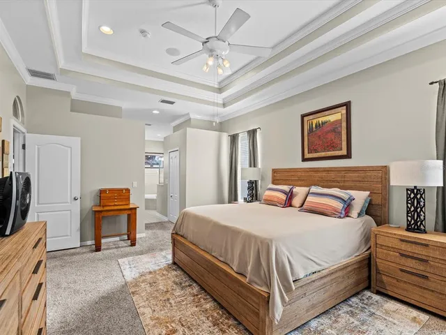 a front view of a house with a yard and a garage