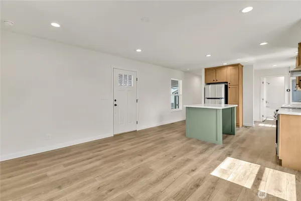 a view of an empty room and window