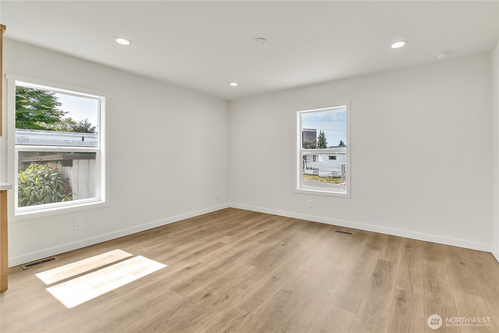 3237 South 182nd Place, Unit 221 SeaTac, WA 98188 - Photo 5 of 14 a view of an empty room and window