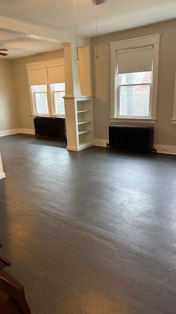 224 Ingram Avenue, Unit 1 Pittsburgh, PA 15205 - Photo 4 of 13 an empty room with wooden floor and windows