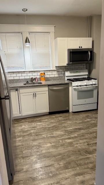 224 Ingram Avenue, Unit 1 Pittsburgh, PA 15205 - Photo 8 of 13 a kitchen with granite countertop a sink and a stove