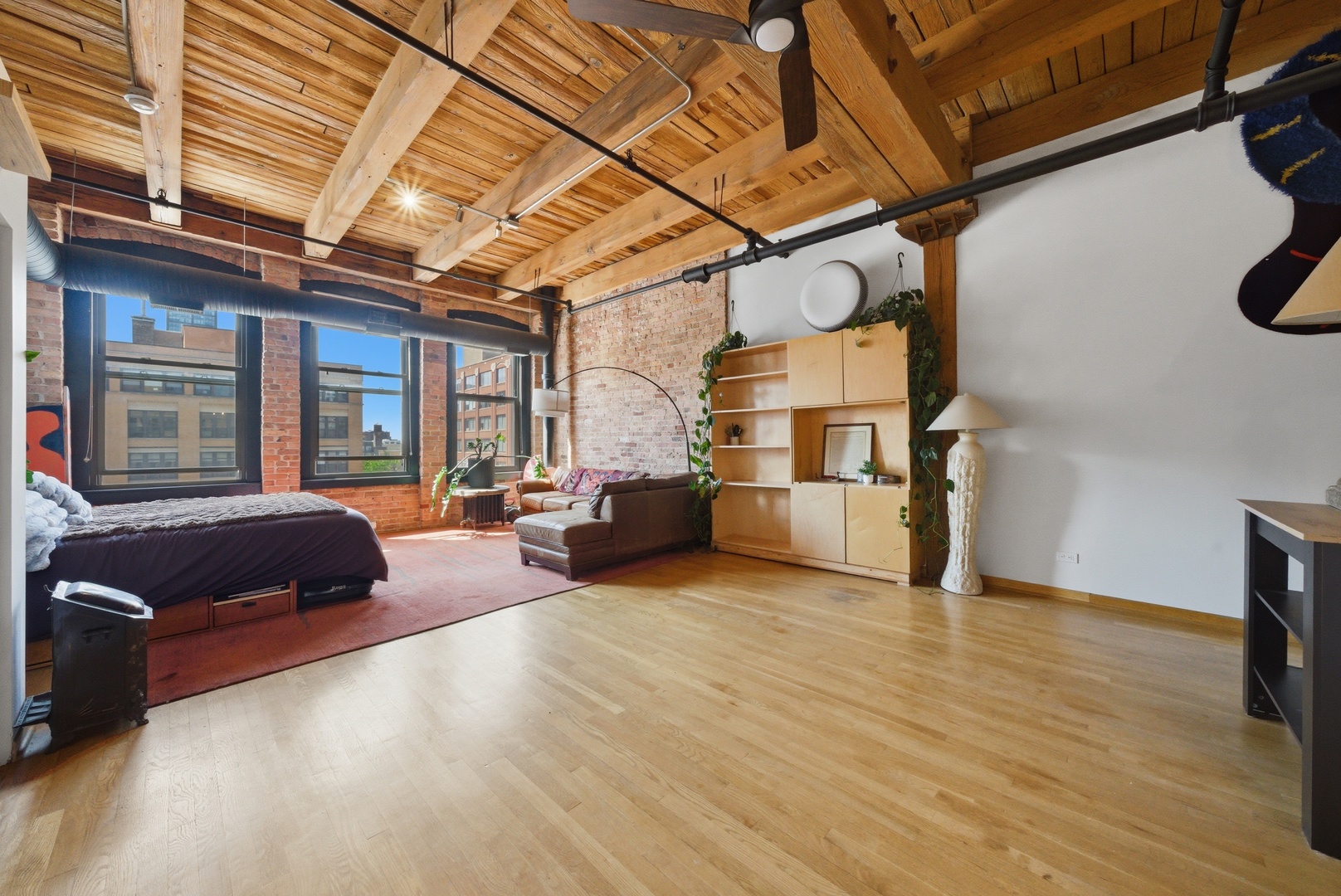 400 South Green Street, Unit 310 Chicago, IL 60607 - Photo 16 of 43 a living room with furniture and a window