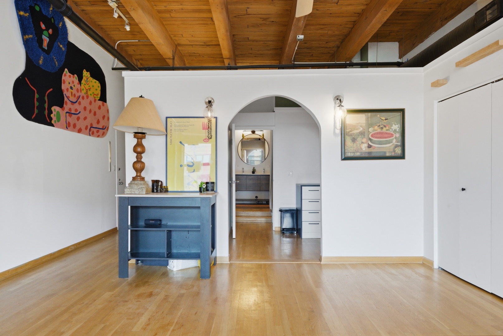 400 South Green Street, Unit 310 Chicago, IL 60607 - Photo 18 of 43 a view of a hallway with wooden floor and furniture
