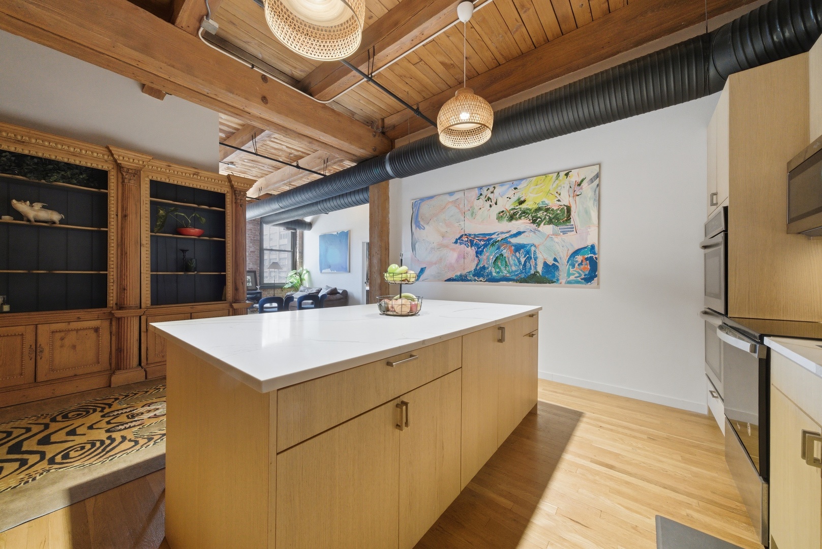 400 South Green Street, Unit 310 Chicago, IL 60607 - Photo 21 of 43 a view of kitchen with wooden floor