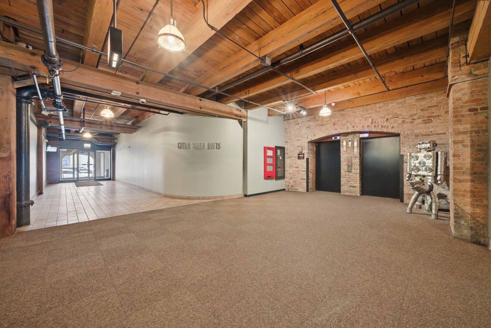 400 South Green Street, Unit 310 Chicago, IL 60607 - Photo 3 of 43 a view of empty room with wooden ceiling