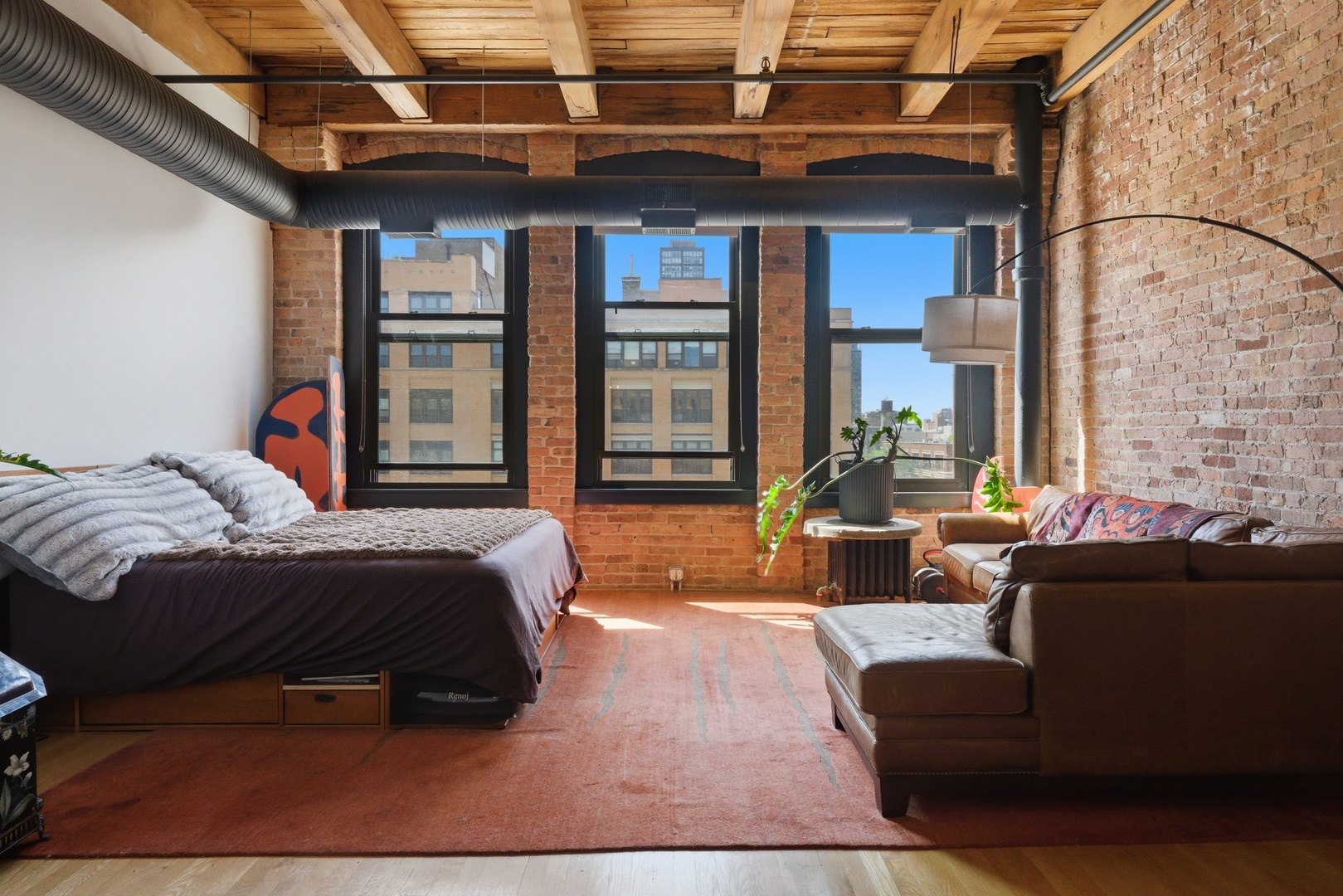 400 South Green Street, Unit 310 Chicago, IL 60607 - Photo 35 of 43 a bed sitting in a bedroom next to a larger window