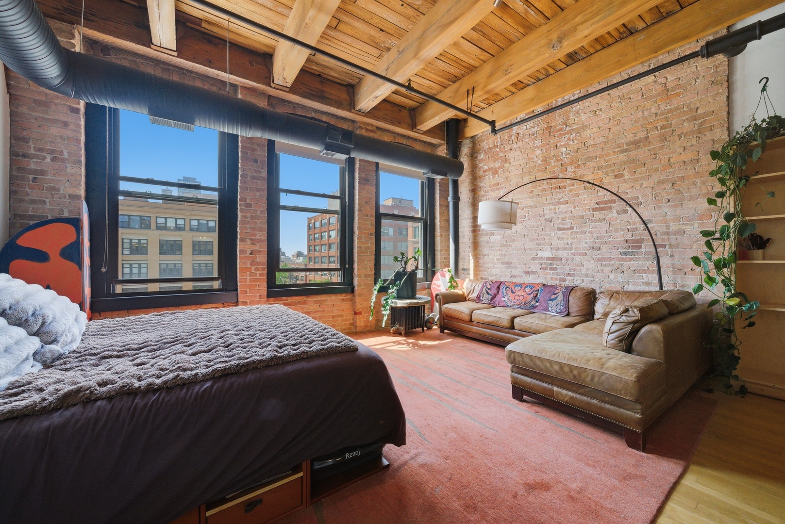 400 South Green Street, Unit 310 Chicago, IL 60607 - Photo 36 of 43 a bedroom with bed couch and window