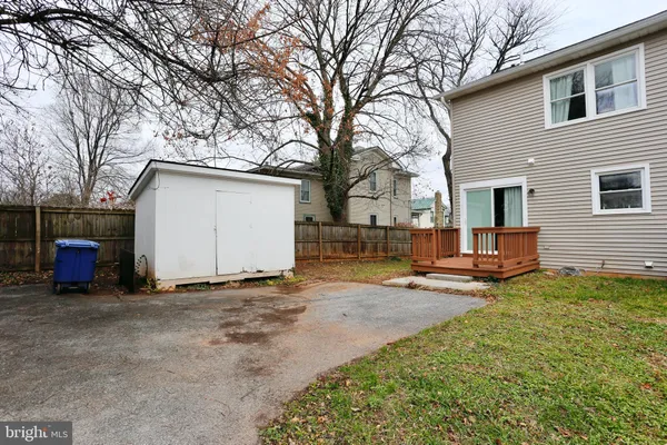 a view of a backyard with a sitting area