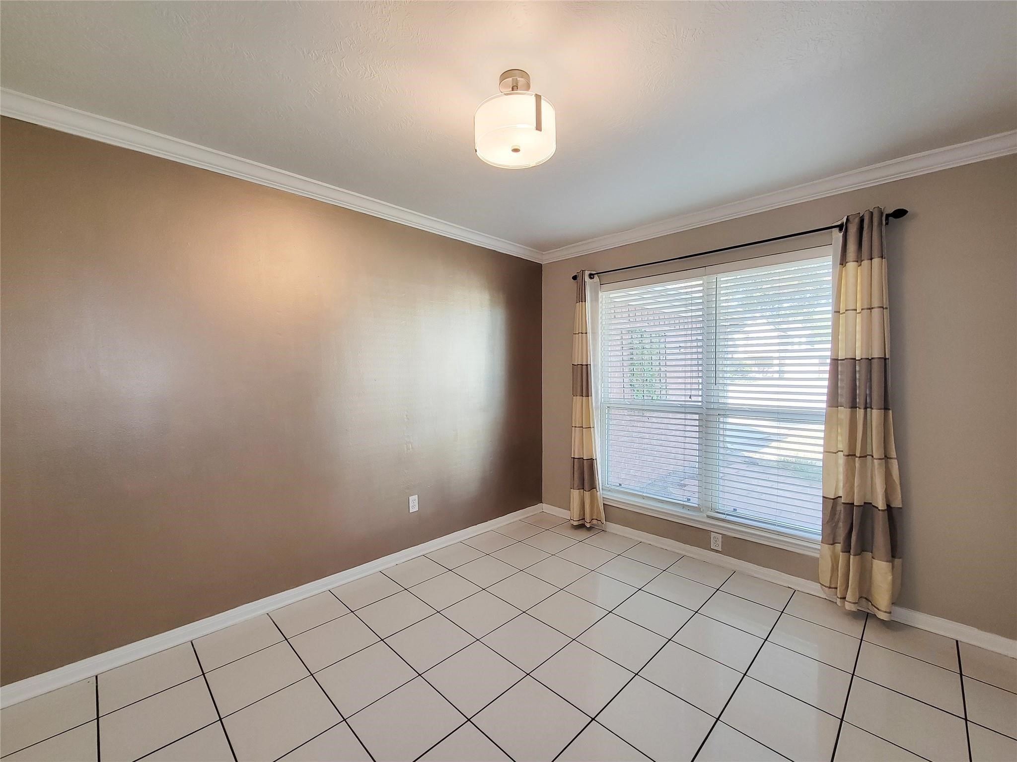 23327 Sandpiper Trail Spring, TX 77373 - Photo 15 of 22 a view of an empty room and window