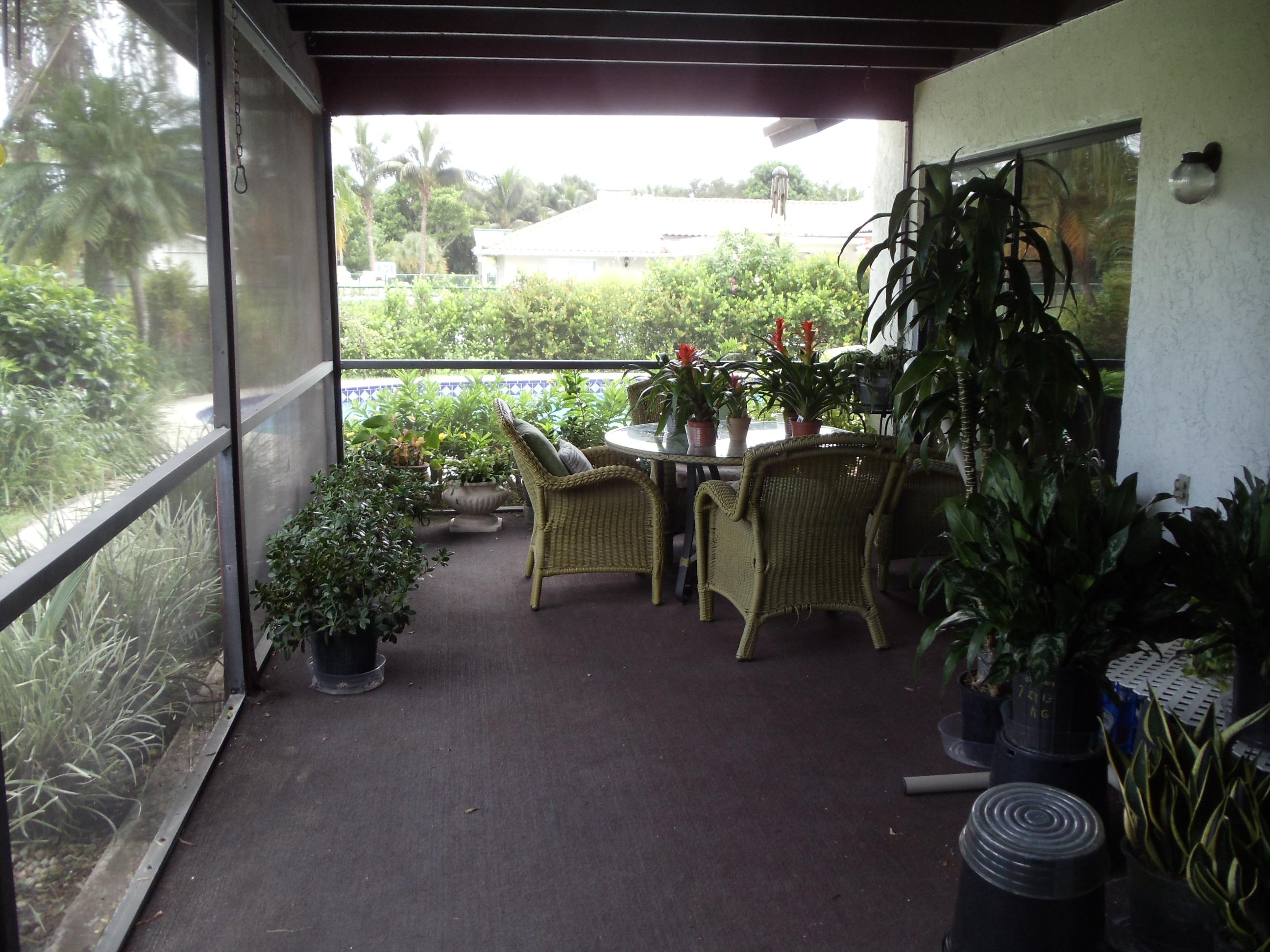 512 Old Country Road South Wellington, FL 33414 - Photo 21 of 28 Screened in Patio