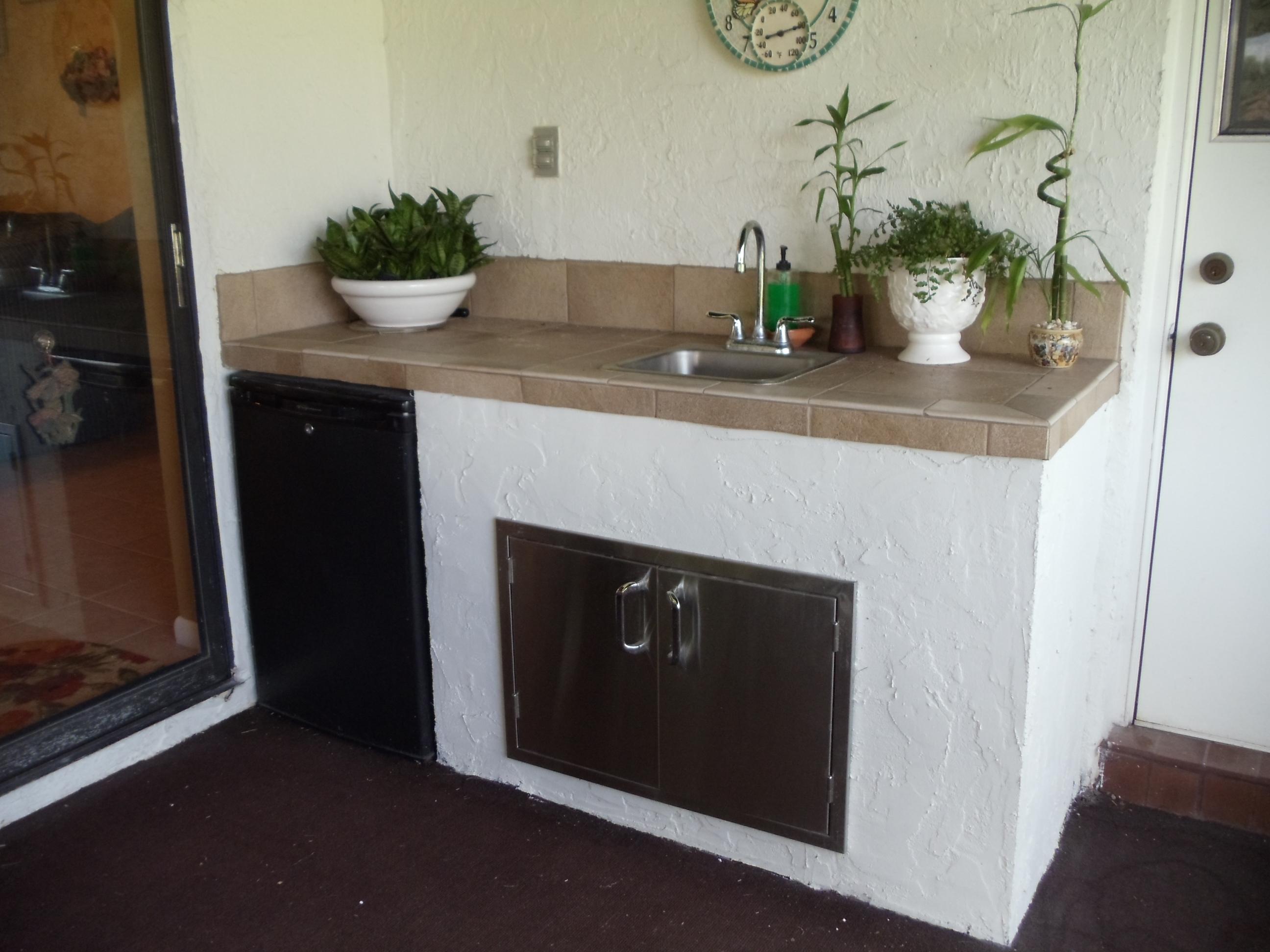 512 Old Country Road South Wellington, FL 33414 - Photo 22 of 28 Summer kitchen