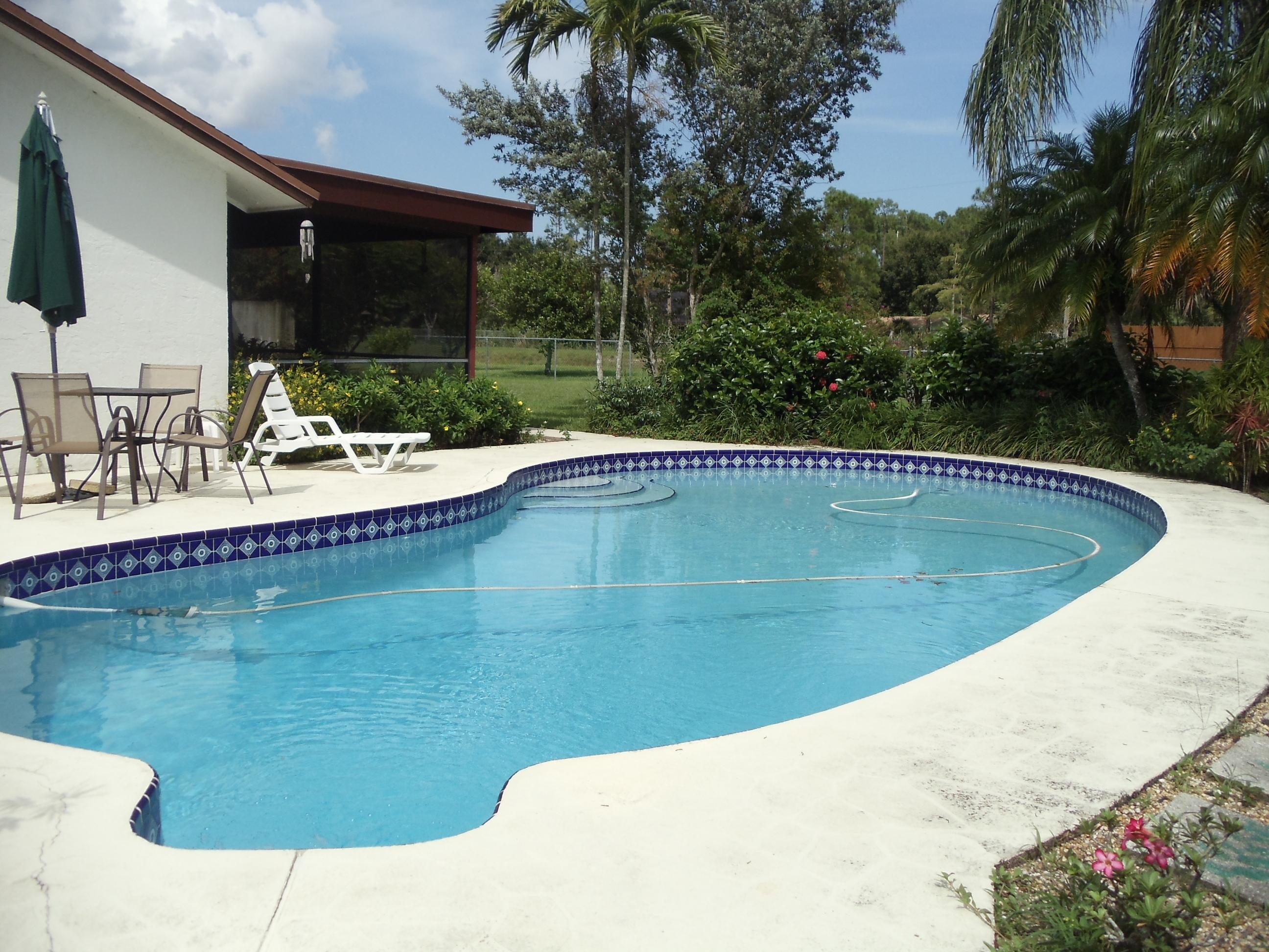 512 Old Country Road South Wellington, FL 33414 - Photo 25 of 28 Freeform Pool