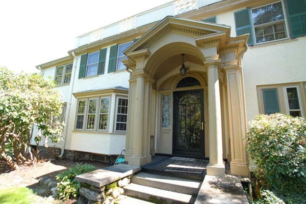 25 Somerset Road Lexington, MA 02420 - Photo 2 of 9 a front view of a house with a garden