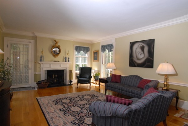 25 Somerset Road Lexington, MA 02420 - Photo 6 of 9 a living room with furniture and a fireplace