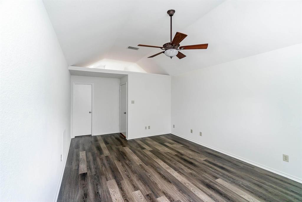 1905 Lansdown Court Carrollton, TX 75010 - Photo 15 of 23 a view of a room with a sink and cabinets