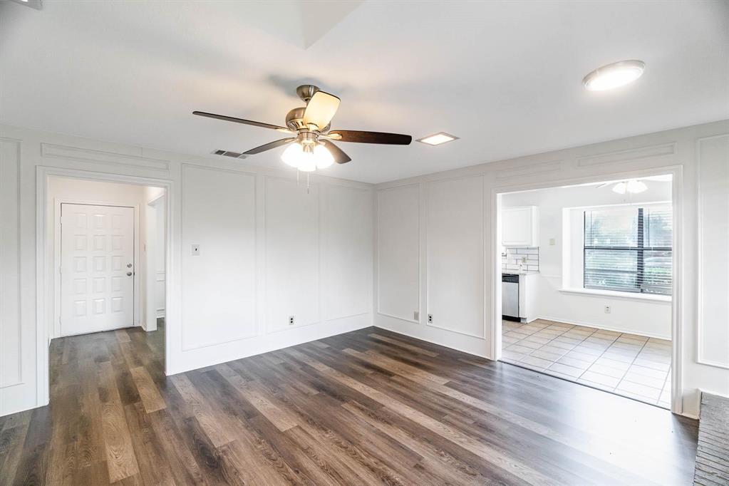 1905 Lansdown Court Carrollton, TX 75010 - Photo 18 of 23 a view of empty room with wooden floor and fan