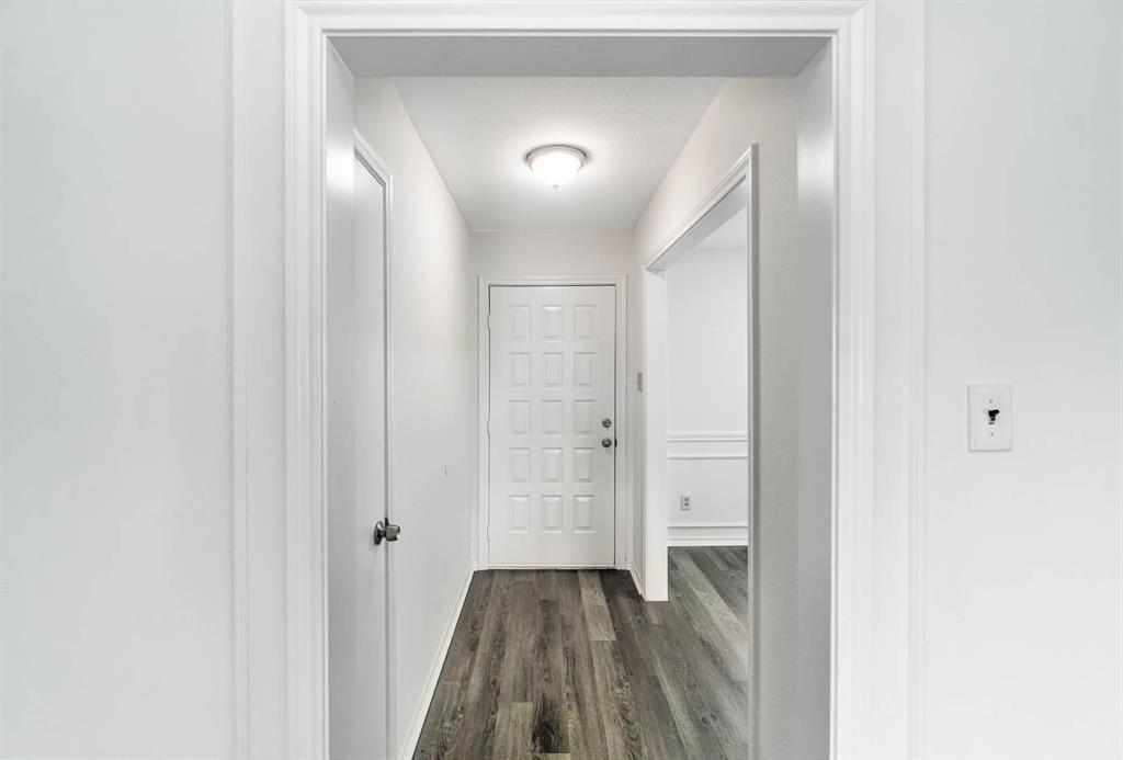 1905 Lansdown Court Carrollton, TX 75010 - Photo 4 of 23 a view of hallway with wooden floor