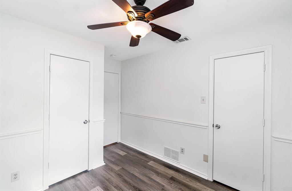 1905 Lansdown Court Carrollton, TX 75010 - Photo 10 of 23 wooden floor in an empty room