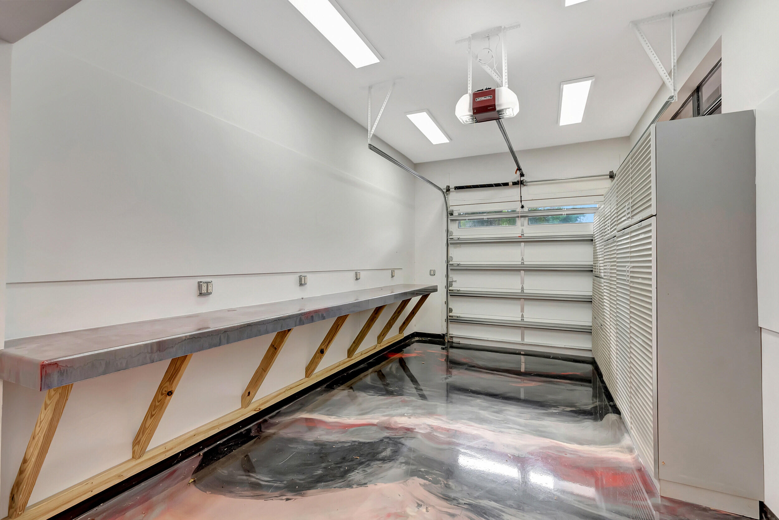 7555 Mandarin Drive Boca Raton, FL 33433 - Photo 37 of 40 7555 1 car golf cart