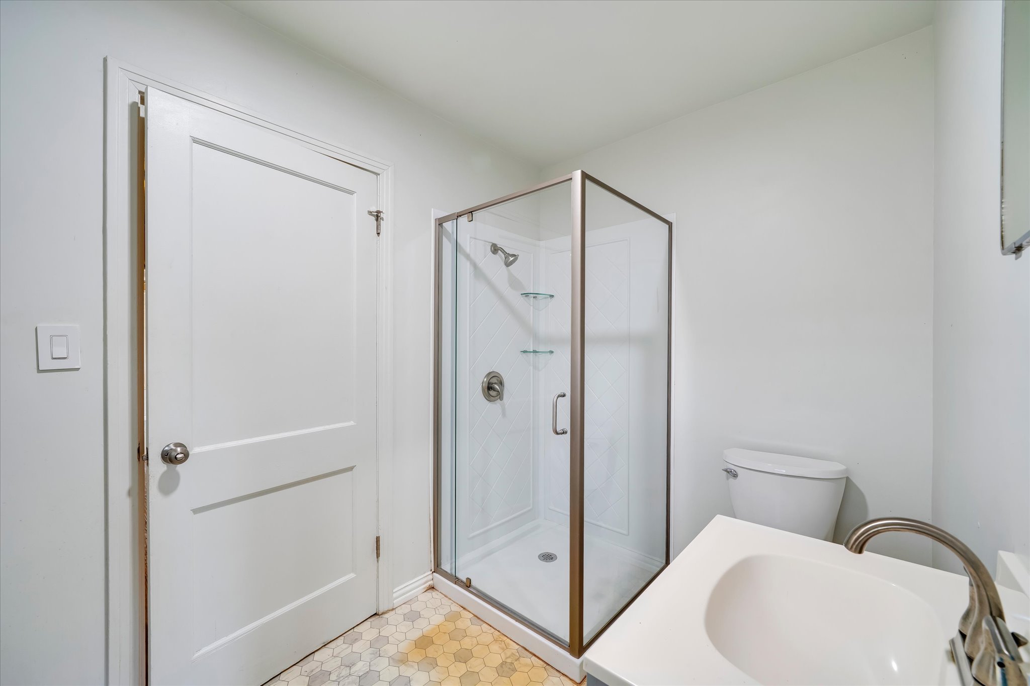 1206 Ruth Avenue Austin, TX 78757 - Photo 15 of 37 a bathroom with a shower and a toilet