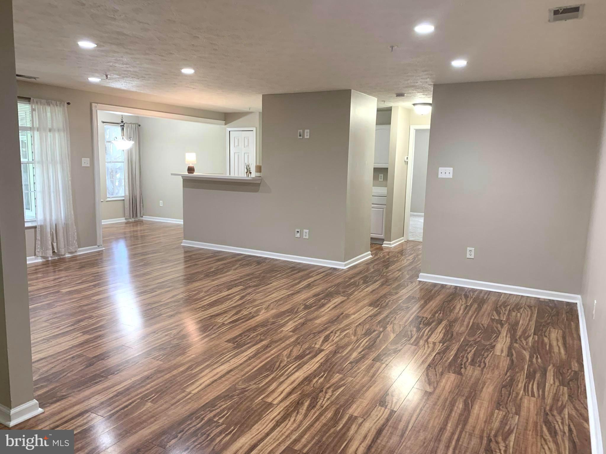 7907 Valley Manor Road, Unit 103 Owings Mills, MD 21117 - Photo 4 of 32 Living Room/Dining Room/Kitchen