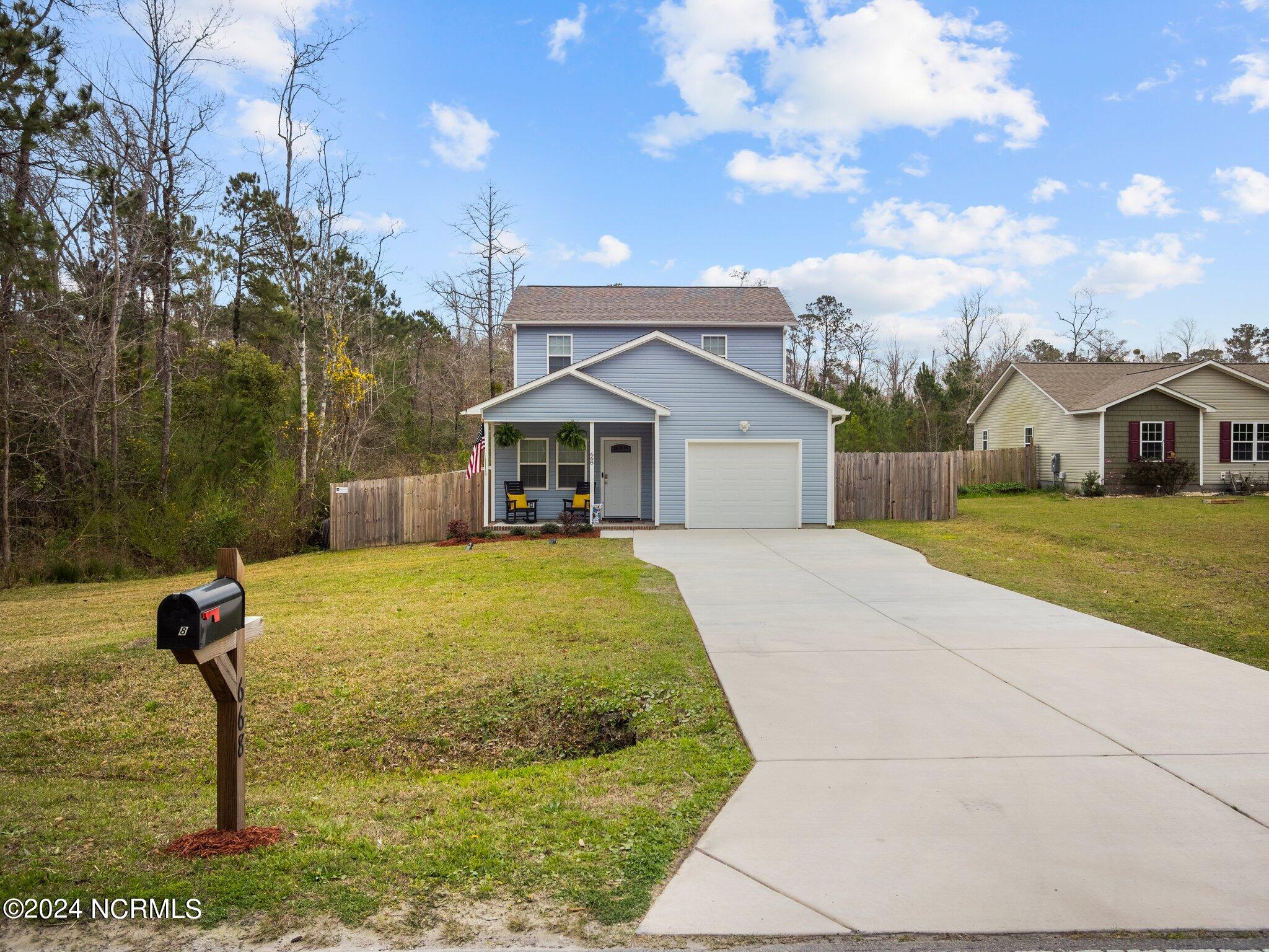 668 Riggs Road Hubert, NC 28539 - Photo 1 of 54 Front