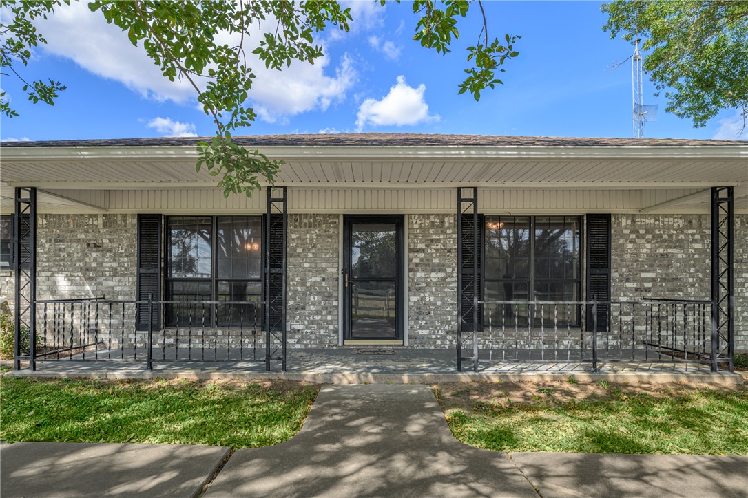 6700 FM 332 Road Brenham, TX 77833 - Photo 12 of 36 a view of a house with a outdoor space