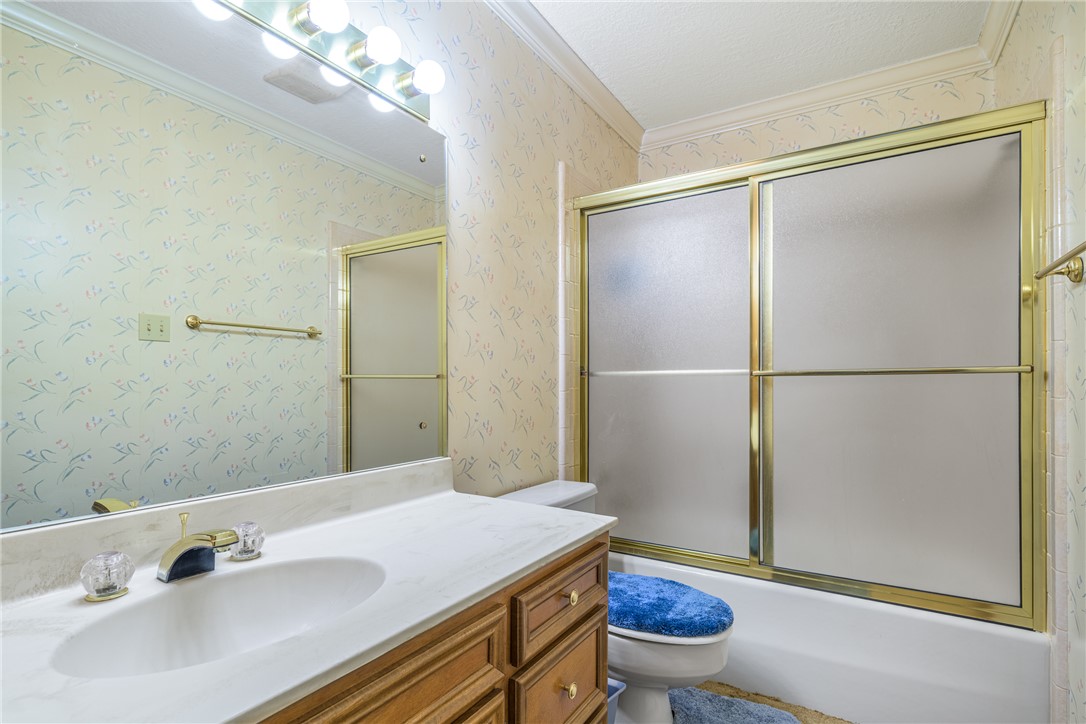 6700 FM 332 Road Brenham, TX 77833 - Photo 22 of 36 a bathroom with a sink and a mirror