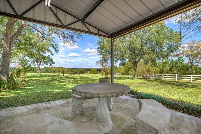 a view of a porch with a backyard