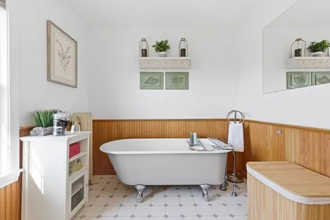 a view of a bathtub in a bathroom