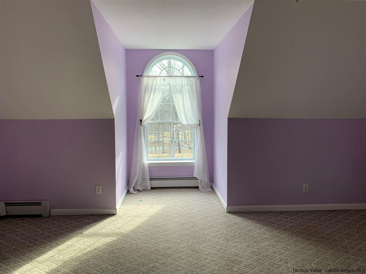 14 Beecher Hill Road Wallkill, NY 12589 - Photo 29 of 35 an empty room with a fireplace