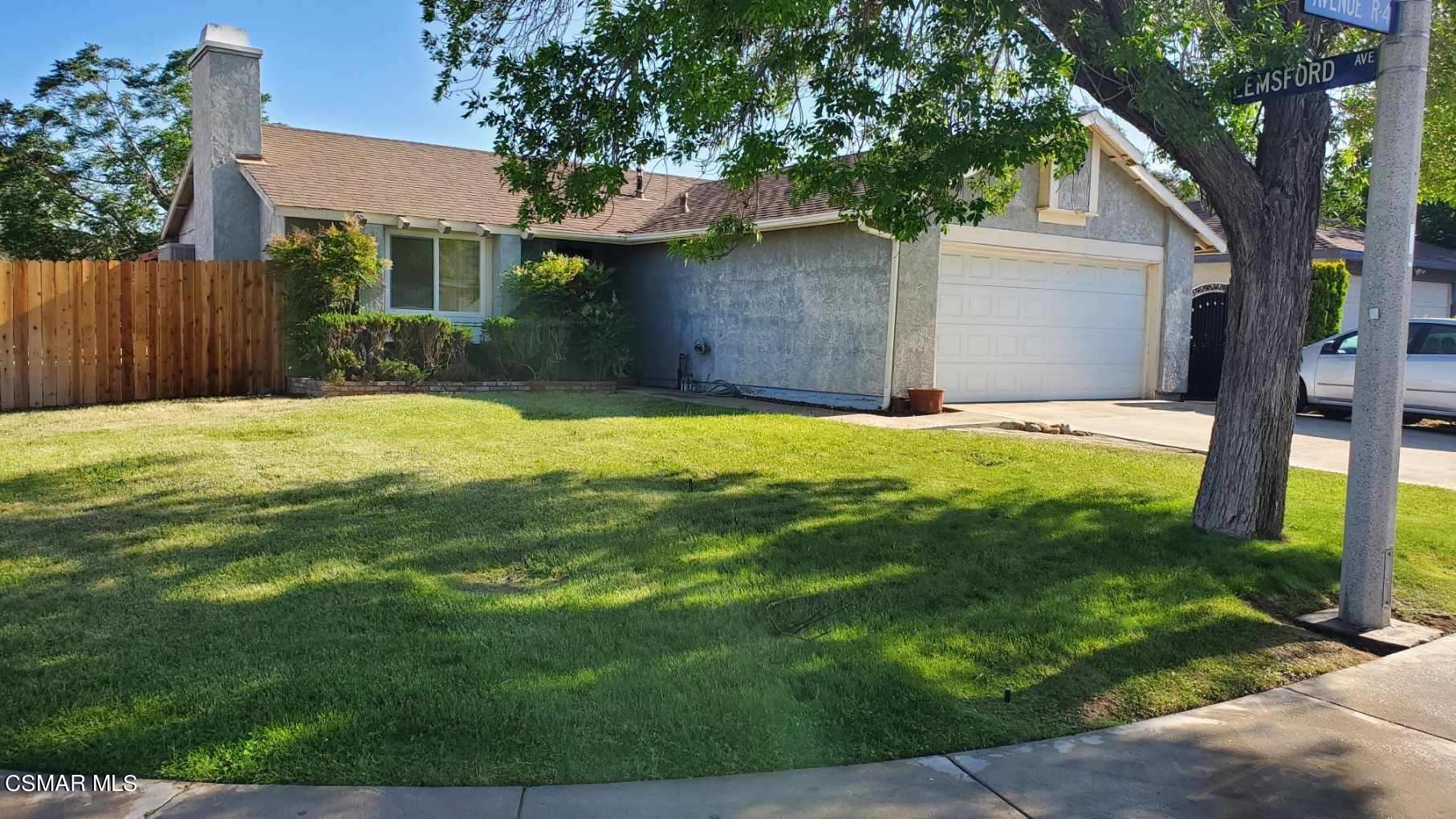 3108 East Avenue R4 Palmdale, CA 93550 - Photo 1 of 2 a house with yard in front of it