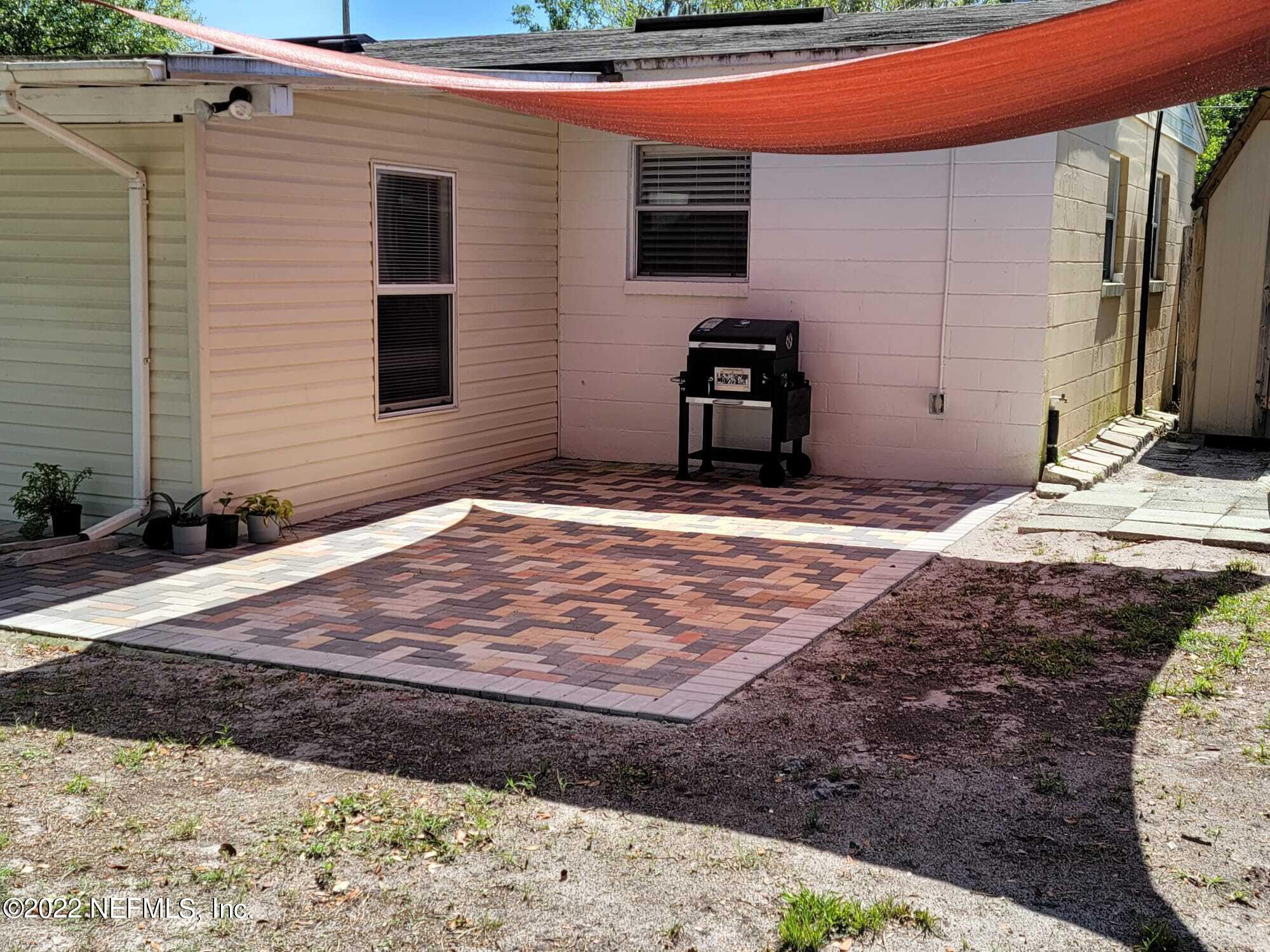 7371 Wheat Road Jacksonville, FL 32244 - Photo 16 of 28 Partially paved backyard