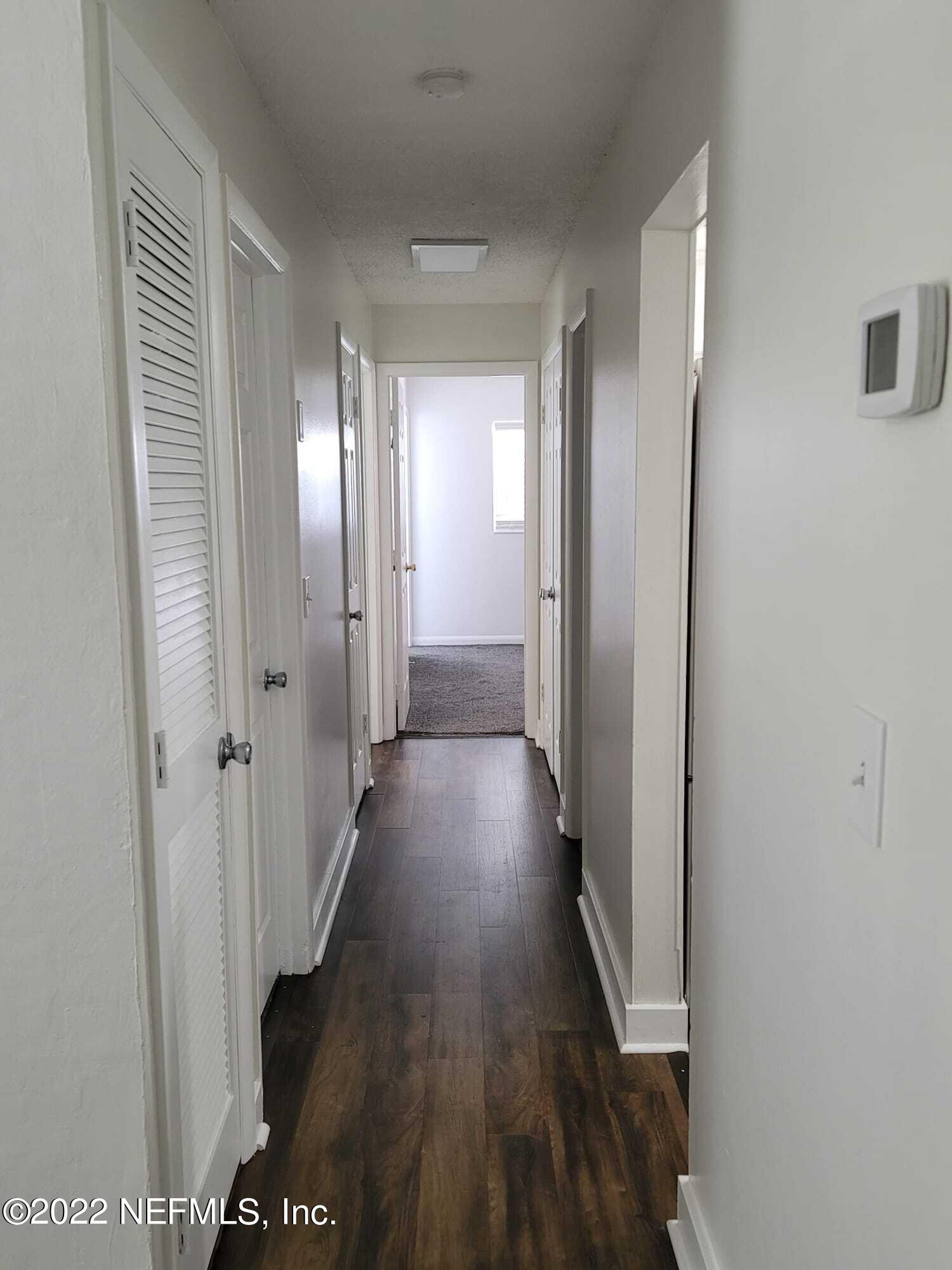 7371 Wheat Road Jacksonville, FL 32244 - Photo 24 of 28 Hall/Bedrooms