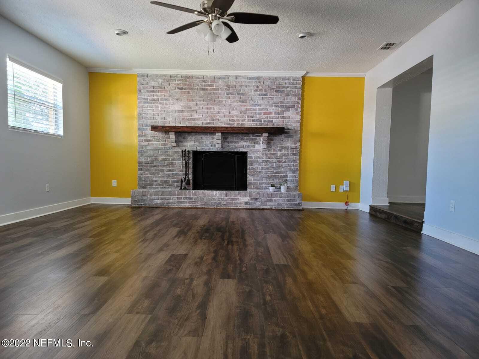 7371 Wheat Road Jacksonville, FL 32244 - Photo 28 of 28 Family room/Fireplace