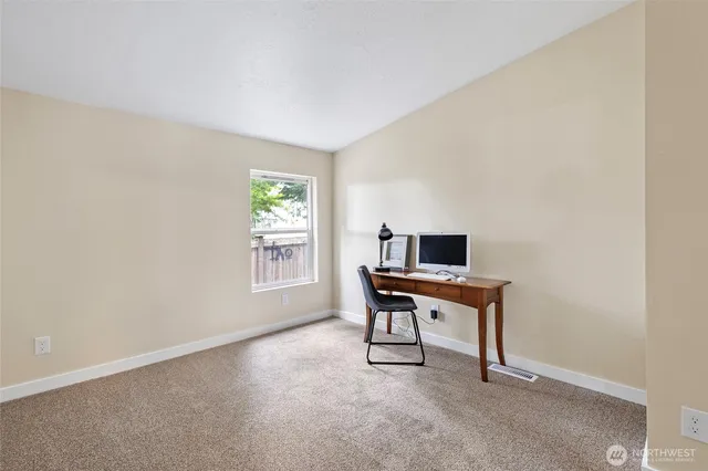 a room with furniture and a window