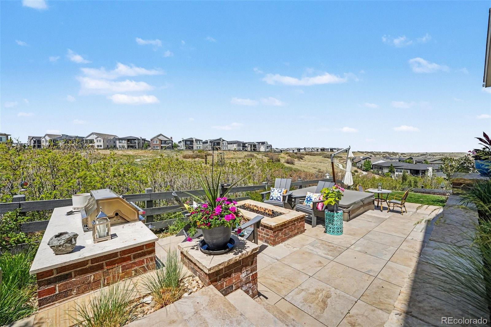 2101 Rim Ridge Drive Castle Pines, CO 80108 - Photo 6 of 50 an outdoor view with patio