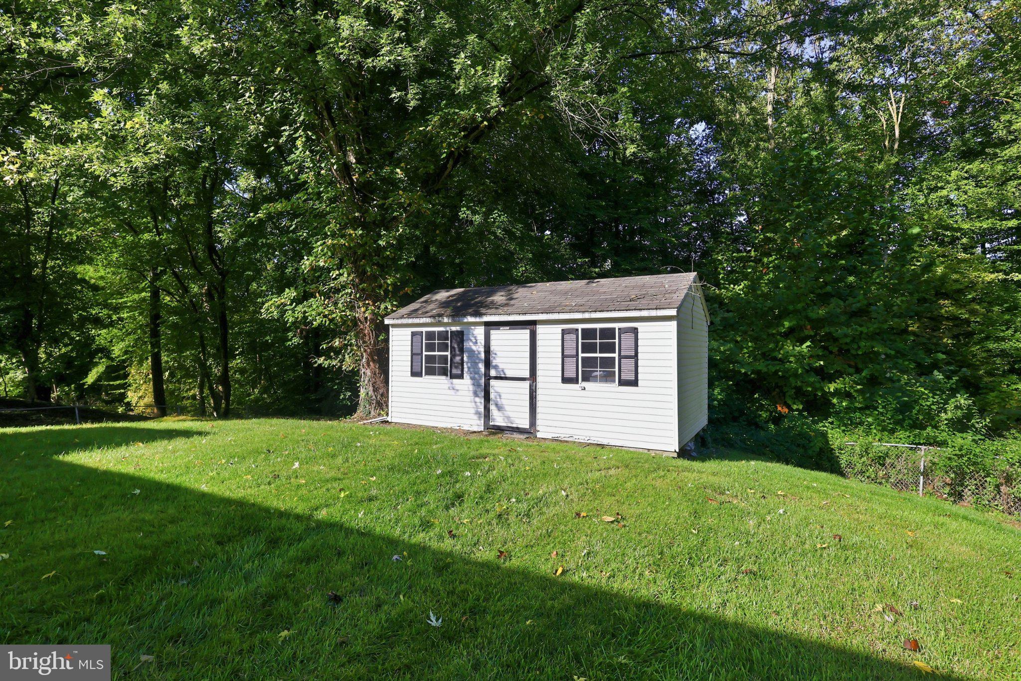 13528 Delaney Road Woodbridge, VA 22193 - Photo 33 of 39 Shed storage keeps bulky gear out of the garage