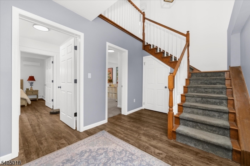 128 East Main Street Lebanon, NJ 08833 - Photo 14 of 36 a view of a hallway with wooden floor and entryway